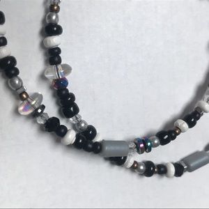 Hand beaded necklace with spike accents